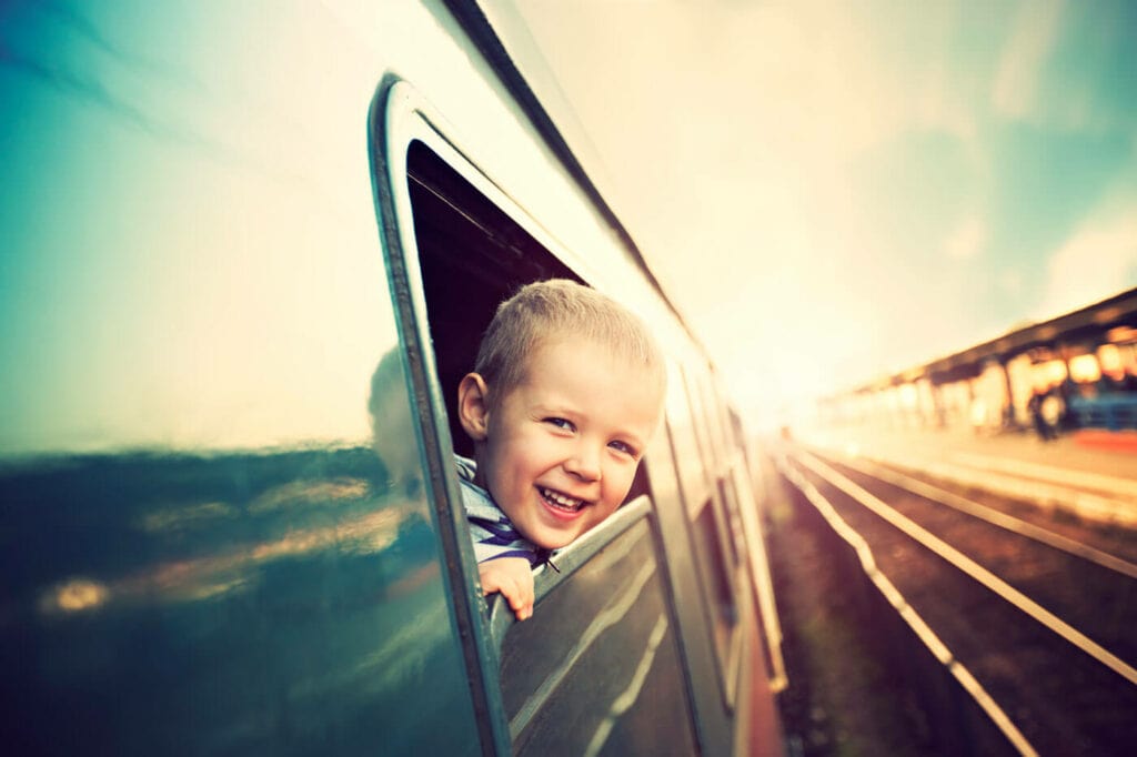 Train Travel - Child looking out of window